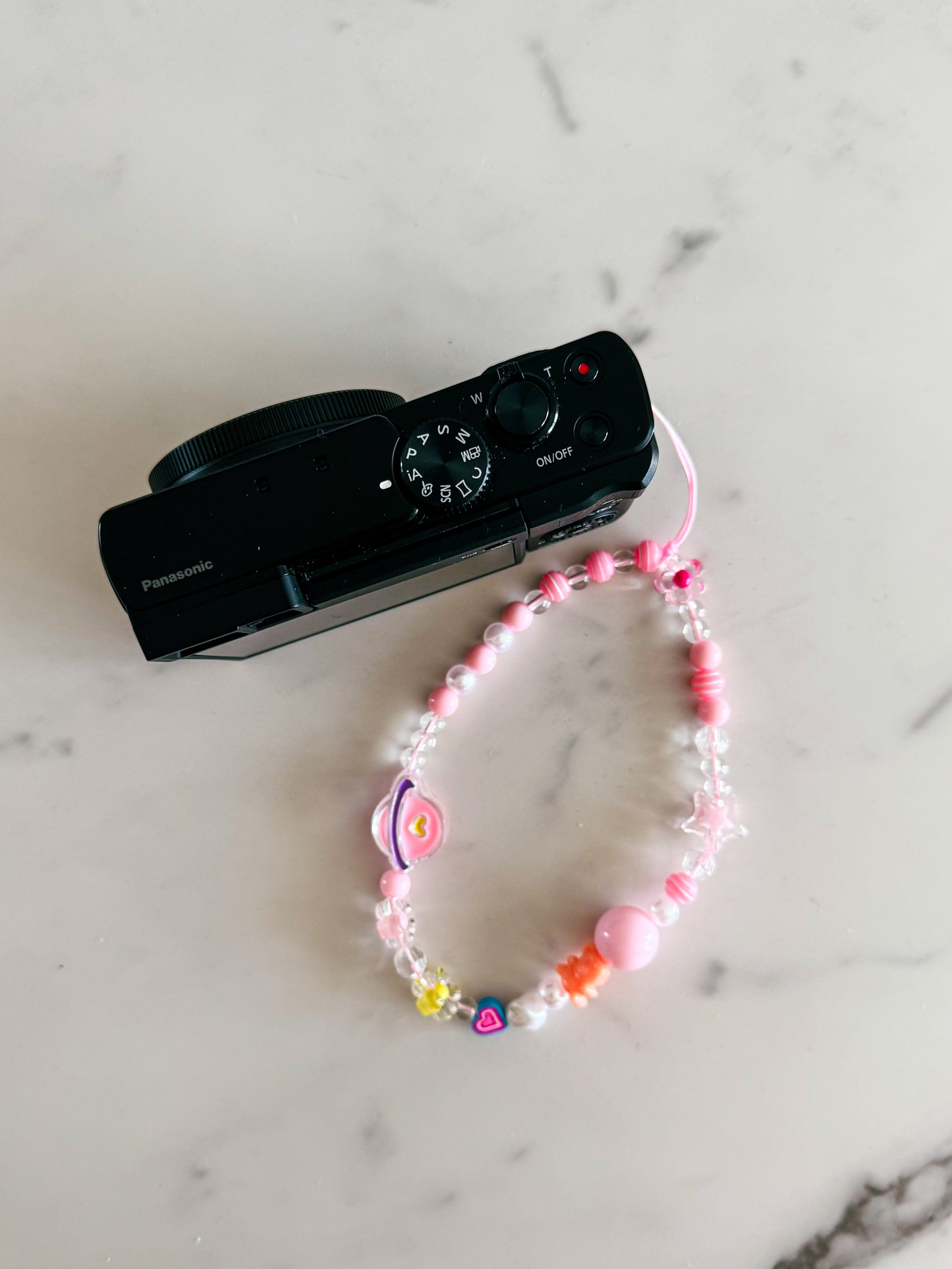 pink saturn phone charm strap