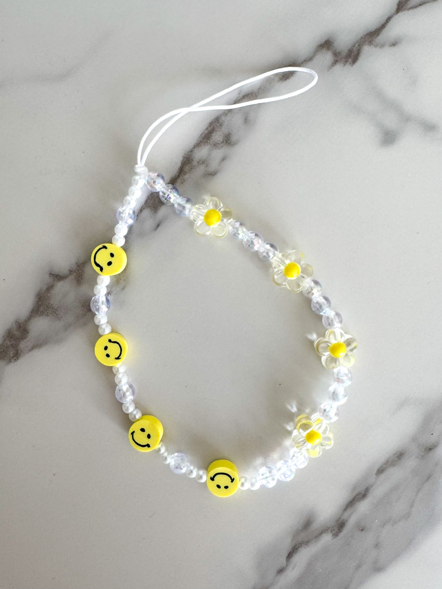stop and smize the flowers phone charm strap