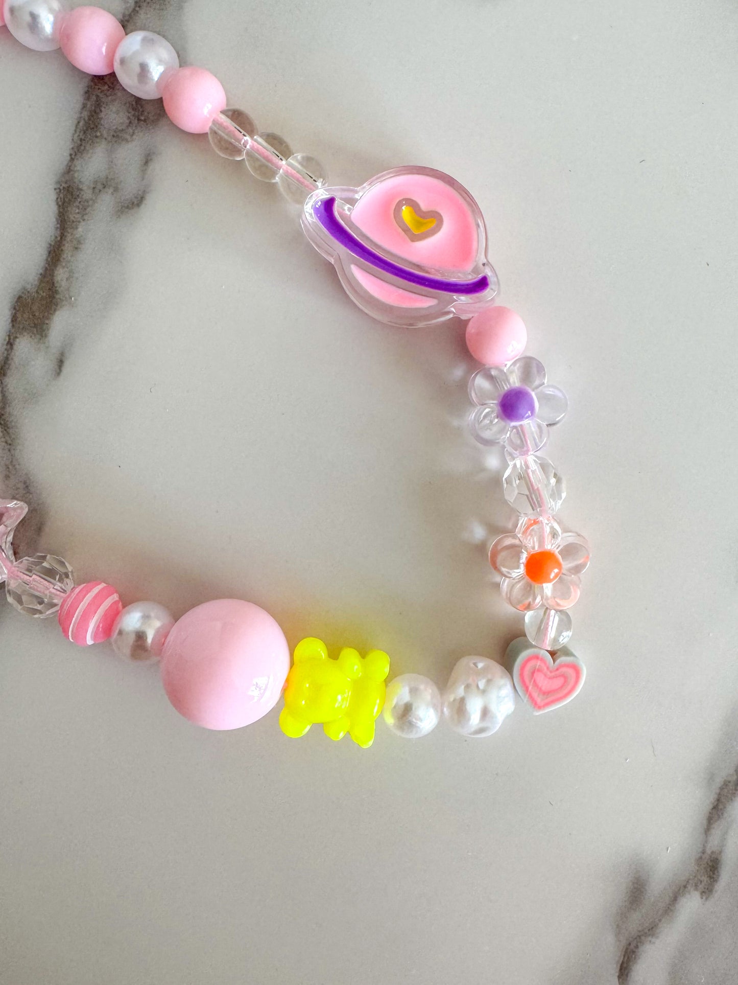 pink saturn phone charm strap
