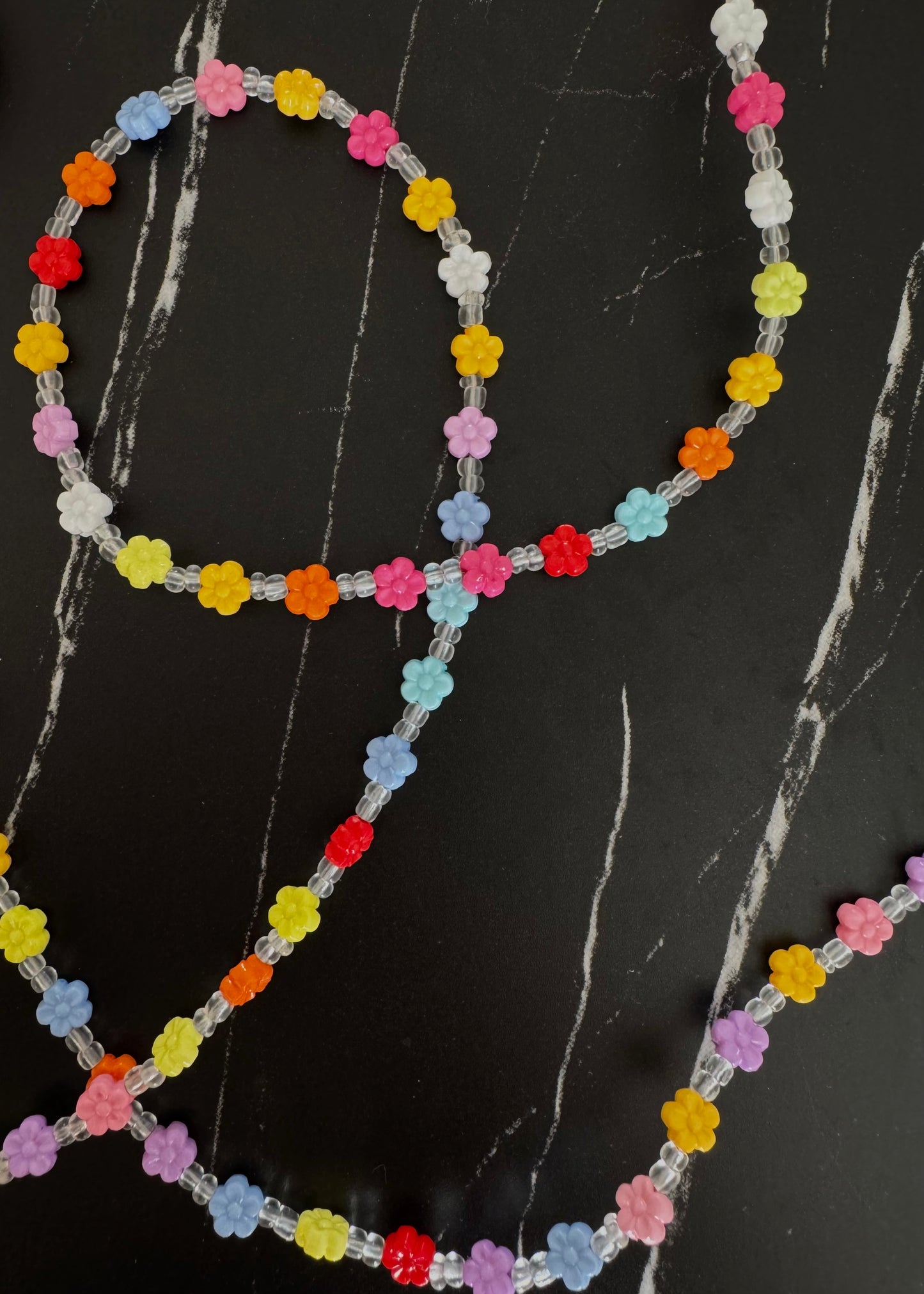 colorful daisy crossbody phone chain